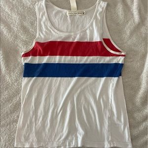 white stripped blue and red tank top .